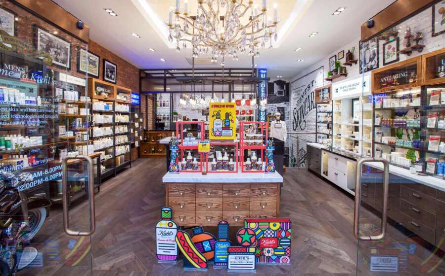 Retail interior showing hand painted graphics integrated into the Kiehl’s Regent Street flagship store