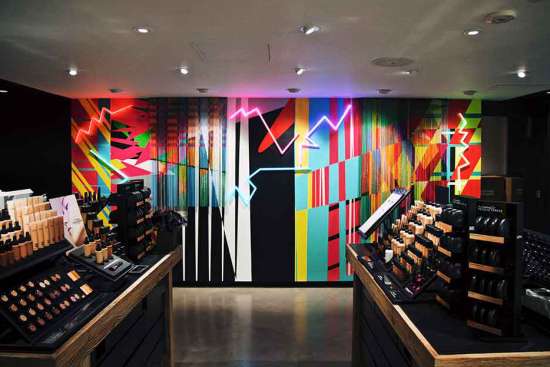 Feature wall mural designed by Eli Sudbrack AVAF inside the MAC Cosmetics flagship store on Carnaby Street London