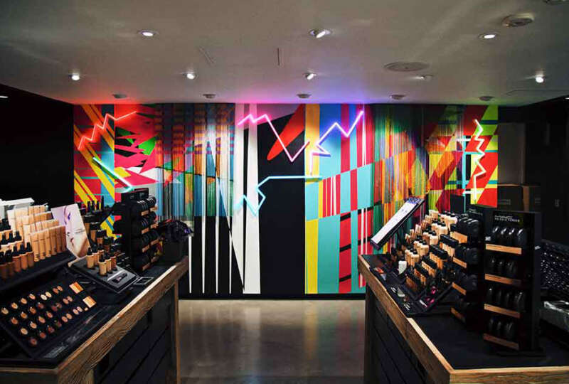 Feature wall mural designed by Eli Sudbrack AVAF inside the MAC Cosmetics flagship store on Carnaby Street London