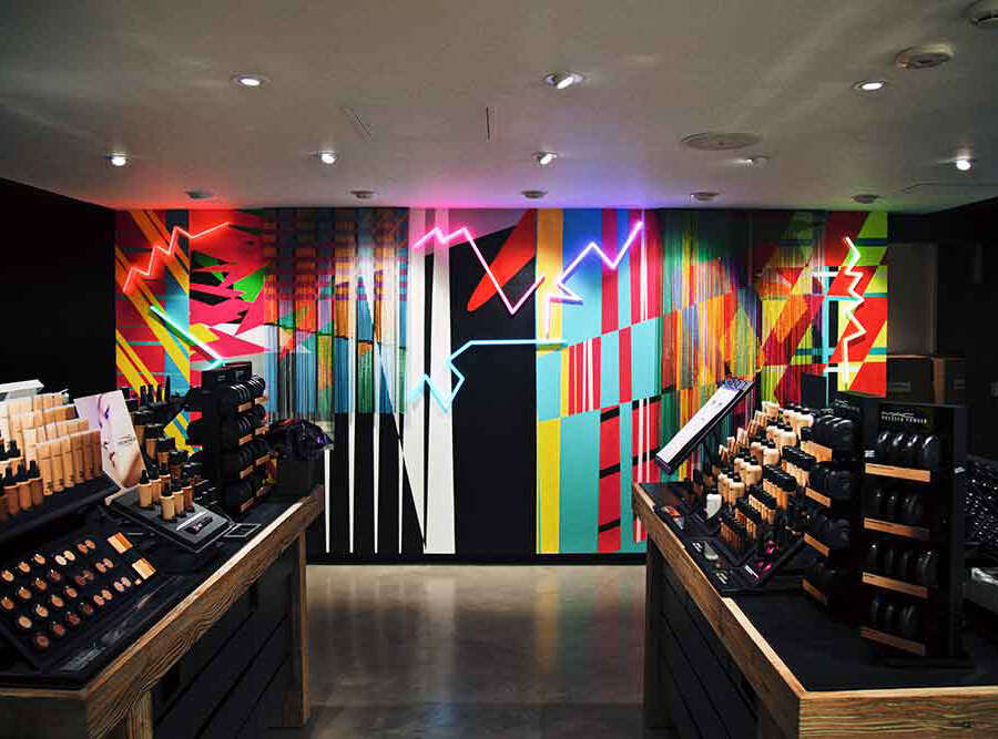 MAC Carnaby Street mural by Eli Sudbrack / AVAF Feature wall mural designed by Eli Sudbrack AVAF inside the MAC Cosmetics flagship store on Carnaby Street London