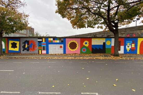Long wall view of Alec Doherty public artwork painted with Airlite air-purifying paint