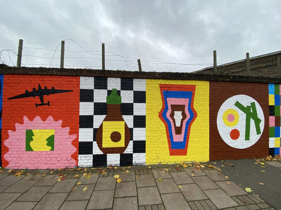 Long wall view of Alec Doherty public artwork painted with Airlite air-purifying paint