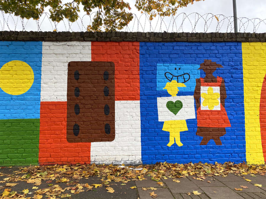 Illustrated biscuit and character panel from Alec Doherty mural referencing Bermondsey history