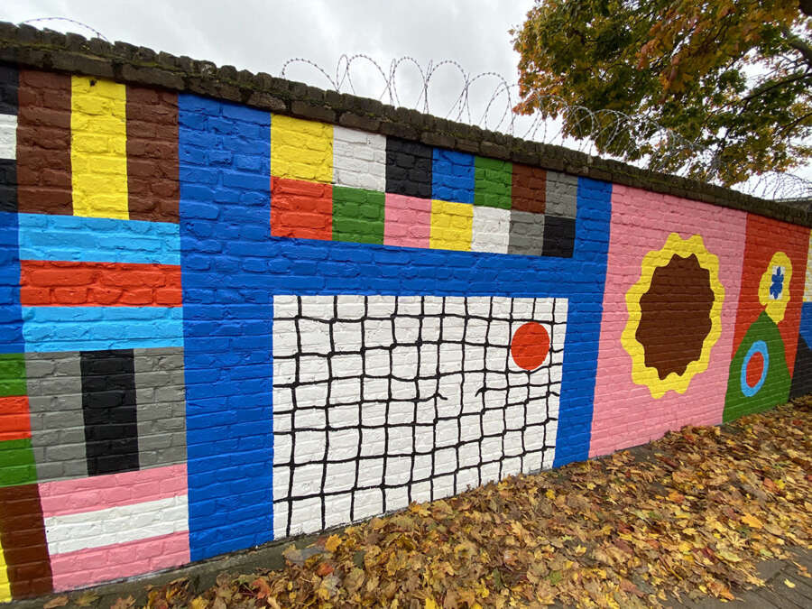 Close view of geometric mural panels from the Alec Doherty Bermondsey wall artwork