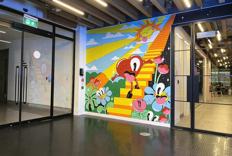 Office lobby mural by Hattie Stewart at EMI London headquarters produced by Absolutely Studio