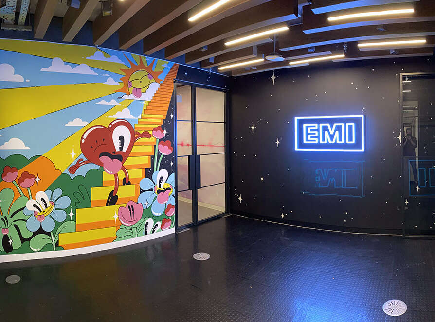 EMI lobby mural and neon sign Hattie Stewart mural artwork and neon EMI sign inside the Universal Music Group office lobby
