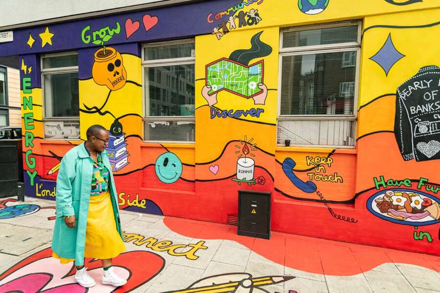 Detail of colourful mural and pavement artwork by Hannah Hill in Bankside London