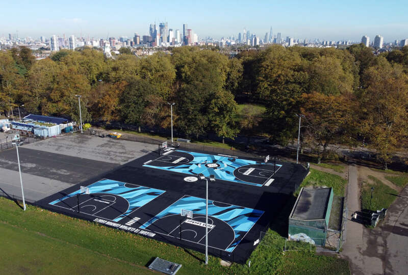 Close-up of centre circle graphic from painted basketball court mural at Clapham Common