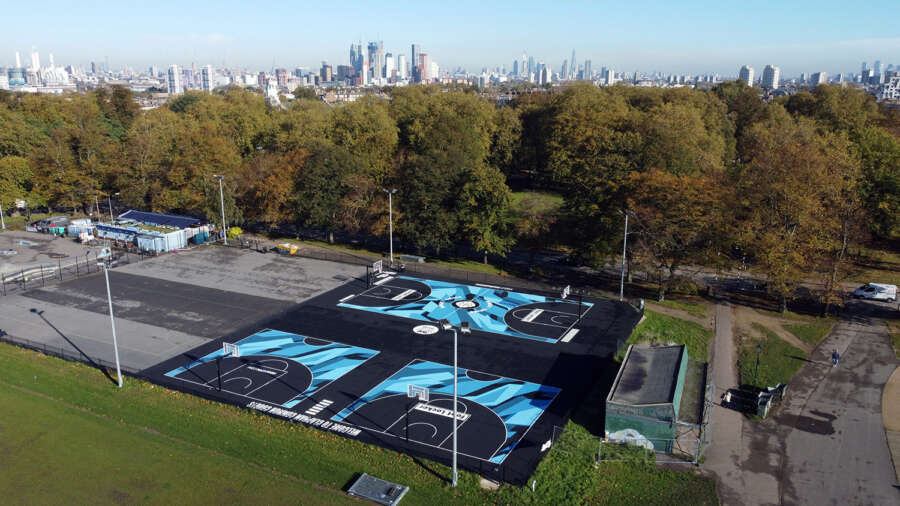 Close-up of centre circle graphic from painted basketball court mural at Clapham Common