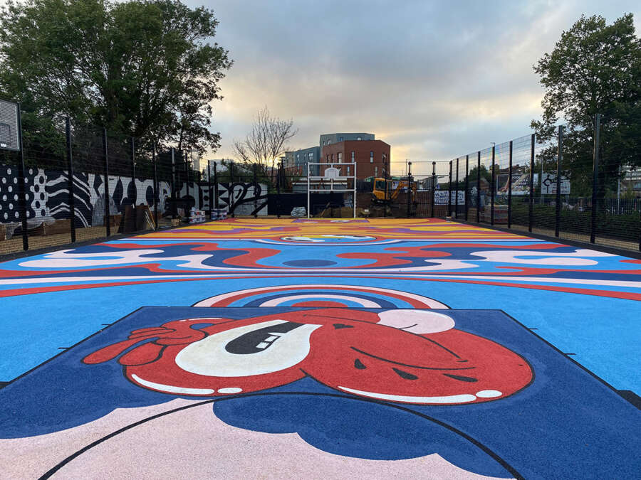 Colourful painted basketball court mural at Orchard Park community court in Portsmouth
