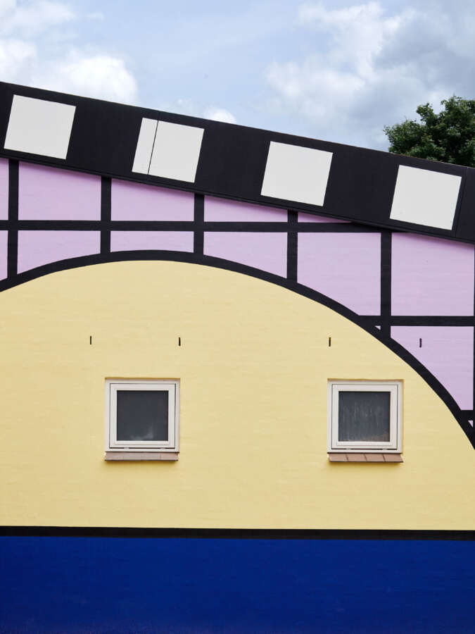 Architectural wall detail from Camille Walala building wrap installation at Montana Furniture Denmark
