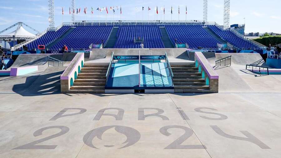 Paris 2024 Olympic skatepark venue entrance with painted graphics and seating