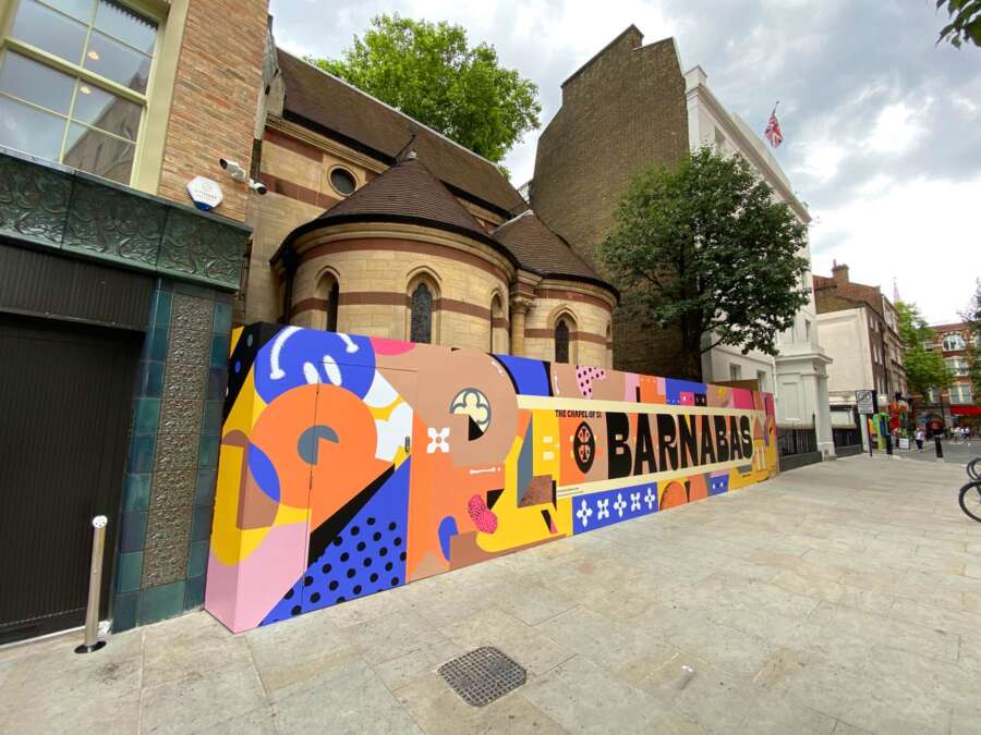 Vinyl hoarding mural outside House of St Barnabas in Soho by Darren John