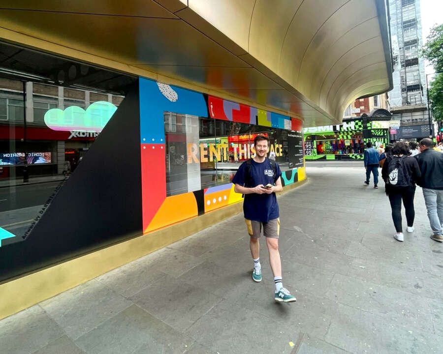 Large-scale vinyl mural installation on retail frontage in Soho London