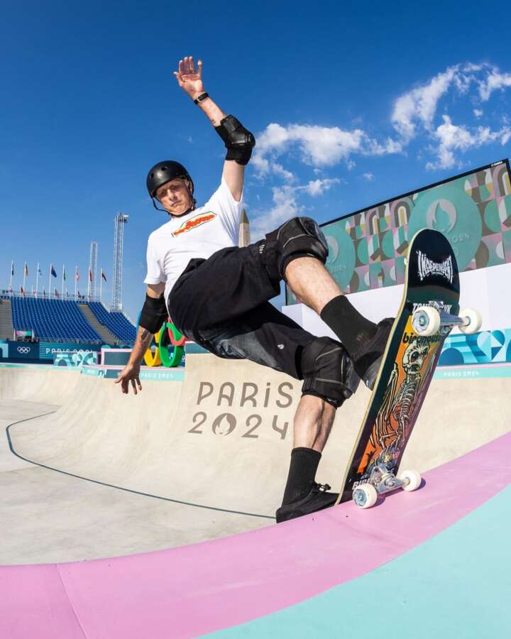 Tony Hawk performing Blunt 180 on painted Olympic skatepark ramp during Paris 2024 preparations