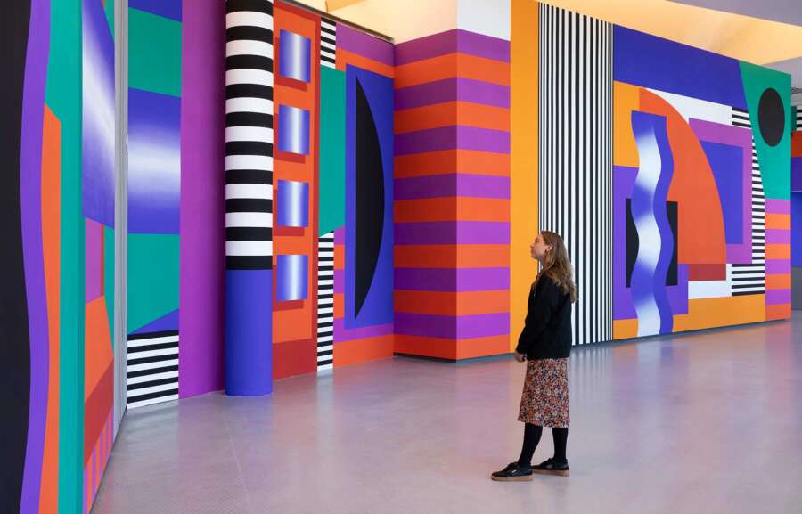 Large geometric installation by Camille Walala inside The Lowry arts centre in Salford