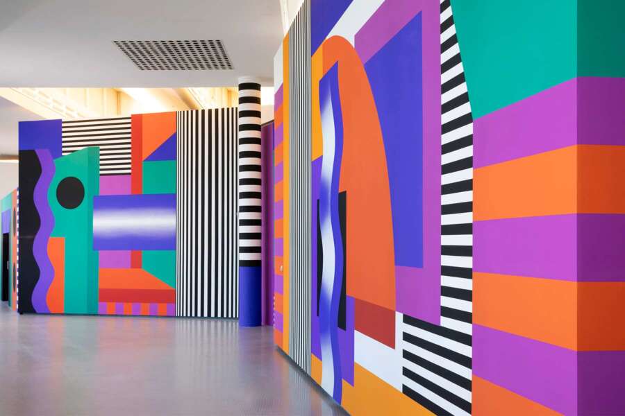 Bold geometric wall installation by Camille Walala at The Lowry arts centre in Salford