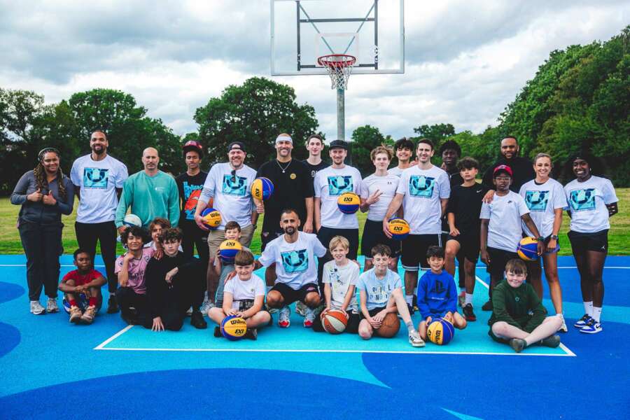 Community launch event at Darren John painted basketball court mural in Barnet, North London