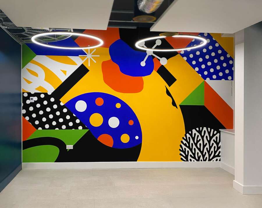 Large abstract mural by Darren John inside the London School of Hygiene & Tropical Medicine building