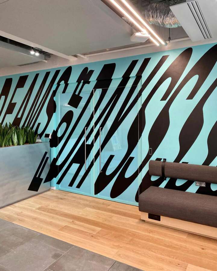 Detail of mural artwork integrated with architectural surfaces at Nike headquarters